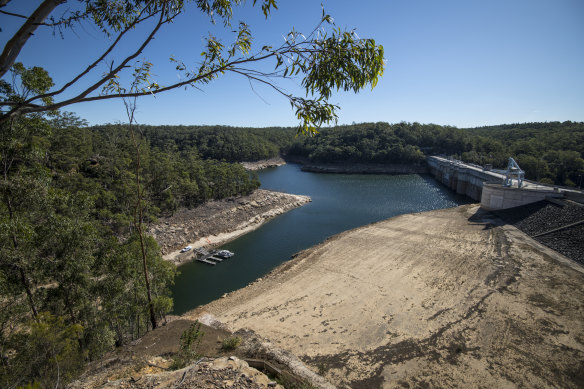Warragamba Dam before the fires, and when water levels were about half of capacity in May 2019.