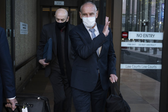 Chris Dawson (right) leaves the NSW Supreme Court last week with his older brother Peter Dawson.