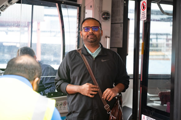 Mithun boards a bus replacement service in Bankstown on Monday morning.