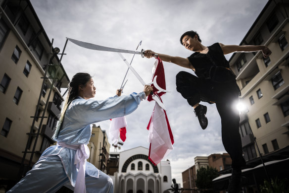 Peony Cheung, left, and Shawn Waychau rehearse for the St George Lunar New Year celebrations.