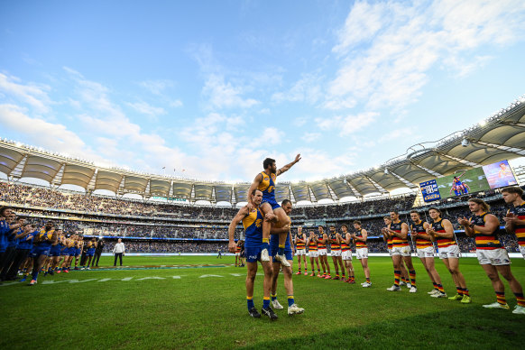 Eagle Josh Kennedy is chaired after his final game Sunday, a 16-point loss to the Crows.