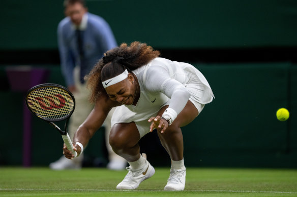 Serena Williams reacts and winces in pain.