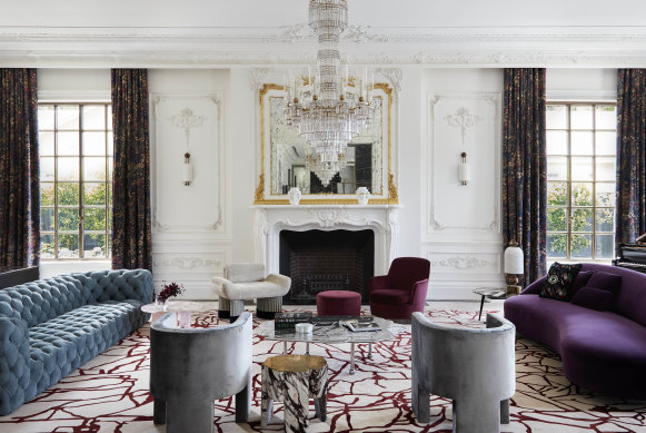 The home features silk carpets and a Baccarat chandelier.