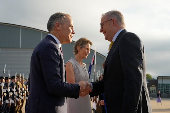 Mark Carney (left) with Albanese in March.