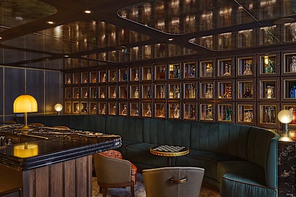 The cosy S.A.L.T. Bar has an illuminated bottle display.