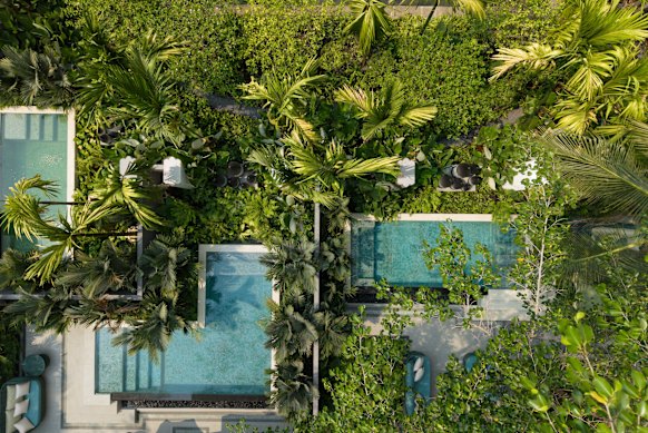 The hotel is wrapped around gardens and courtyards in the heart of one of Asia’s most densely developed cities.
