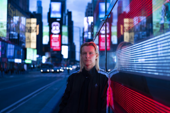 American artist Tabor Robak in Times Square New York.