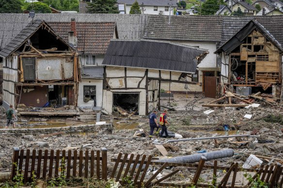 Rescuers assess the damage in the flood-hit town of Schuld, Germany.  
