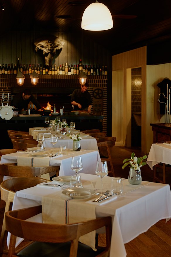 Tedesca’s cosy dining room includes a hearth (pictured) and a fireplace.