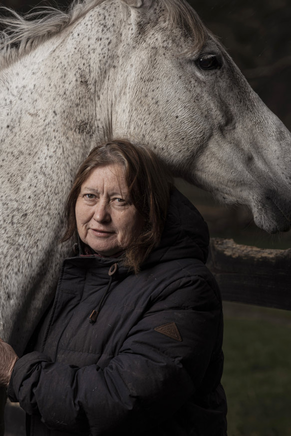 Anne Young and Ghost, a pregnant rescue mare. 