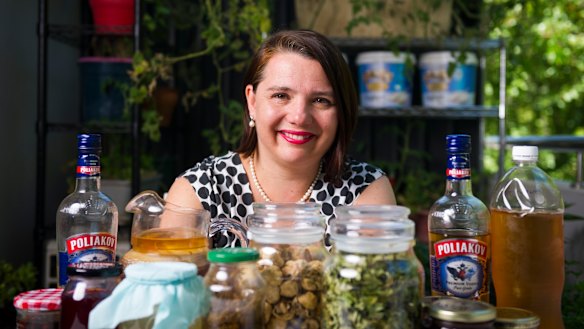 Serina Bird with an assortment of her own handmade kombucha, alcohol, jams and sauces as well as hand-picked tea leaves and mushrooms. 