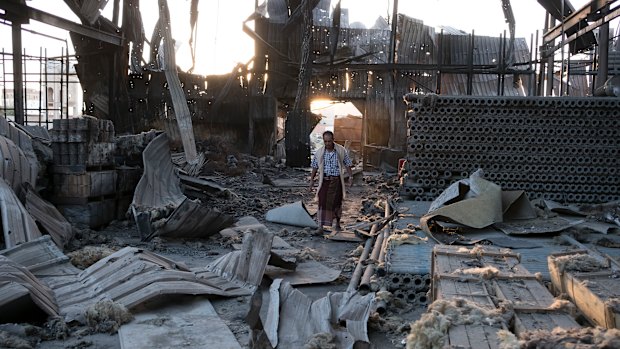 The aftermath of a bombing that destroyed three factories in Sanaa, Yemen, in 2016.