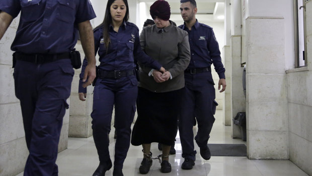 Malka Leifer arrived in court shackled and wearing a red turban.