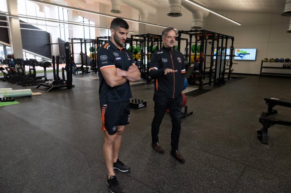 the gym also includes a wrestling arena.