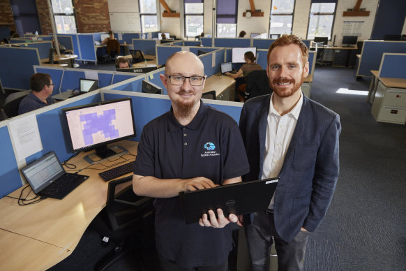 Australian Spatial Analytics founder Geoff Smith (right) with data analyst Chris Pedron.