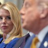 Attorney General Pam Bondi, left, listens as President Donald Trump, right, speaks during a cabinet meeting at the White House, Tuesday, July 8, 2025, in Washington. (AP Photo/Evan Vucci)