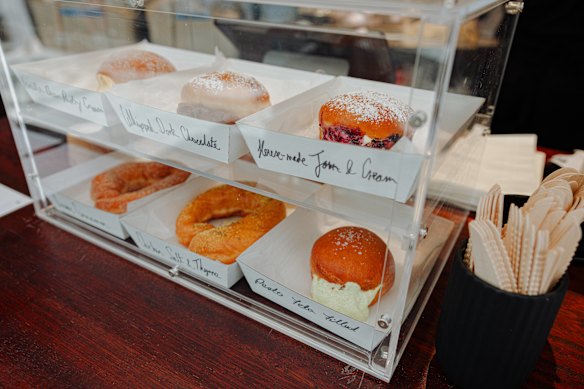 There are around half a dozen doughnuts to choose from. 