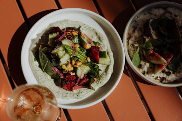 Barbecue corn with plums and macadamia green goddess.