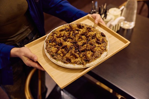 "Rice pizza" with air-dried beef at Apa's Canteen