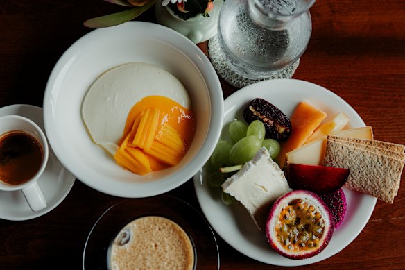 A freddo espresso, stirred yoghurt and seasonal fruit.