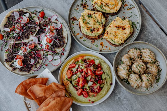 A selection of Yum Yum’s new menu items, including avocado hummus, chilli scramble and kofta tacos.