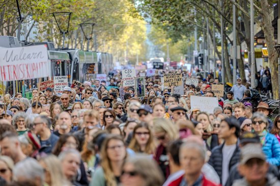 Protesters in Melbourne’s CBD rally on Sunday against gender-based violence,