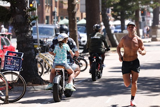 Hectic pace of Manly Beach. 