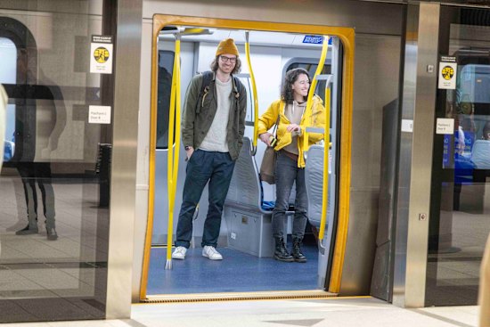 Passengers at Anzac station on Monday. 
