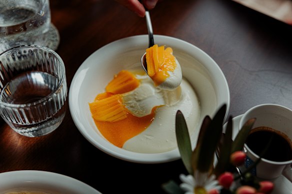 Stirred yoghurt with seasonal fruit.