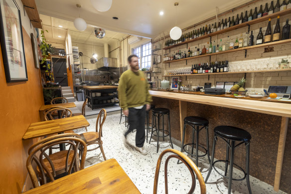 Arnold’s eclectic interior features a cork-tiled bar and a disco ball.