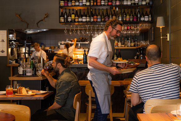 Chefs, including Graham Jefferies, pictured, ferry plates to diners.