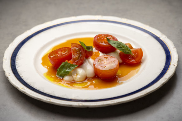 A dish of cherry tomatoes, whipped cod roe and salmon pearls by Kalnins for Hazel restaurant.