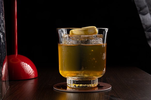 The Paddle Pop rye and bourbon cocktail with a miso-caramel sweetness and a banana lolly garnish.