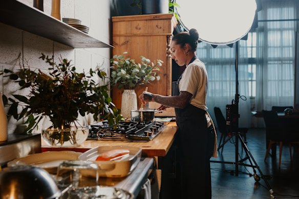 Nat gets busy in the kitchen.