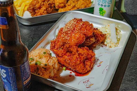  Maple chilli fried chicken with rice ball and coleslaw.
