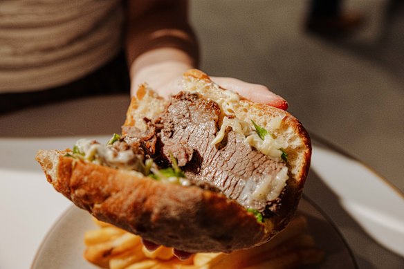 Two slices of brisket in a hard bread roll. Add on a side of chips and you're paying $24 for lunch.