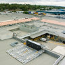 Drones deliver from roof of Queensland shopping centre in world first