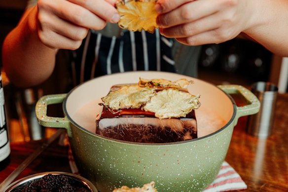 A giant ice block keeps the punch super cool.