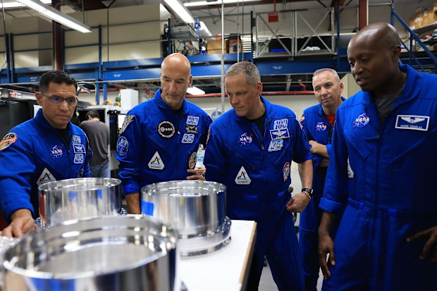 NASA astronaut Frank Rubio, ESA (European Space Agency) astronaut Luca Parmitano, and NASA astronauts Bob Hines, Randy Bresnik, and Andre Douglas visit the Prototype Development Laboratory at NASA’s Kennedy Space Center in Florida
