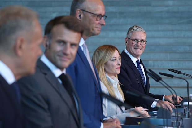 (L-R) Poland's Prime Minister Donald Tusk, France's President Emmanuel Macron, German Chancellor Friedrich Merz, Italy's Prime Minister Giorgia Meloni and Britain's Prime Minister Keir Starmer address the press at the end of their meeting attend during the meeting of the E5 group of nations plus NATO on June 24, 2026 in Berlin, Germany