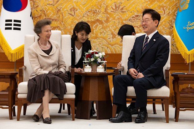 Princess Anne News: Princess Royal shakes hands with robot during South ...