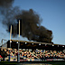 Smoke outside the stadium caused a delay before the game. 