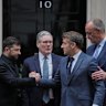 Ukrainian President Volodymyr Zelensky, left, with Britain’s Prime Minister Keir Starmer, French President Emmanuel Macron, and German Chancellor Friedrich Merz on the doorstep of 10 Downing Street in London on Monday.