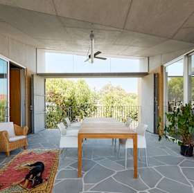 In between the bedroom and living areas is a patio area that can be completely enclosed or open depending on the weather. 