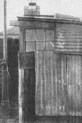 One of the "bungalows" in a blind alley for which a rental of 5 shillings a week is charged.