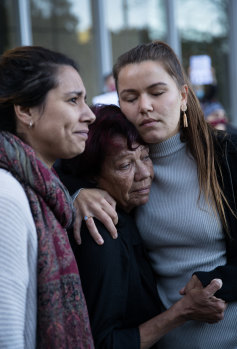 Leetona Dungay, whose son David died in Long Bay jail in 2015, is comforted outside the NSW Supreme Court on Friday.
