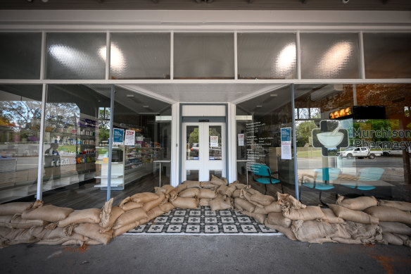 A Murchison shop surrounded by sandbags on Friday.