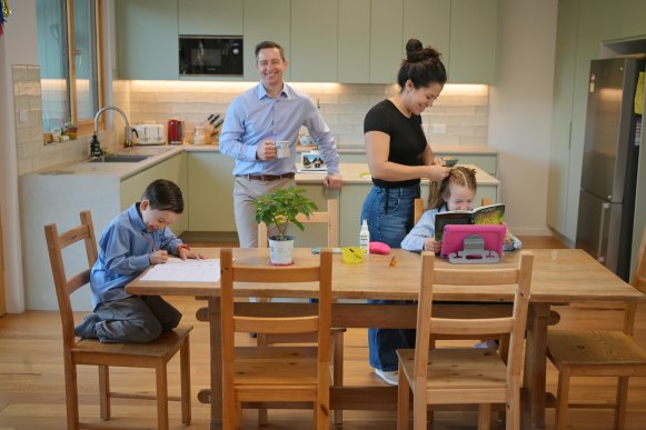 Chris and Maylynne Nunn with children Frankie and Axel in their new home in Asquith in Sydney’s north. The first Green Star accredited home in Australia, it was built to cut heating and cooling bills with double glazing, solar power, heat transfer and air purification.