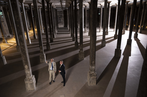 Art Gallery of NSW director Michael Brand with Arts Minister Ben Franklin in the cavernous space that is the Tank Gallery. 