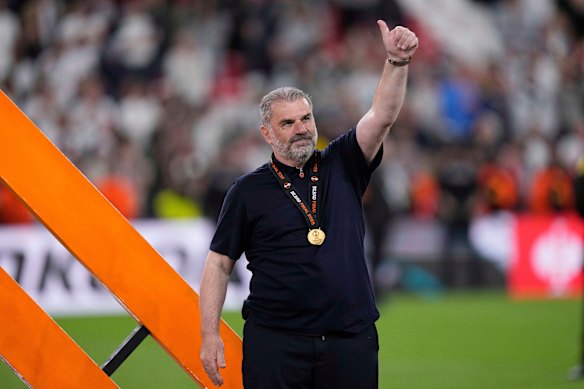 Ange Postecoglou acknowledges Tottenham fans after his side’s win in the Europa League final.